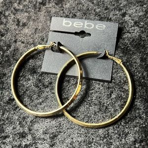Bebe simple gold 2 1/4 inch hoop earrings
